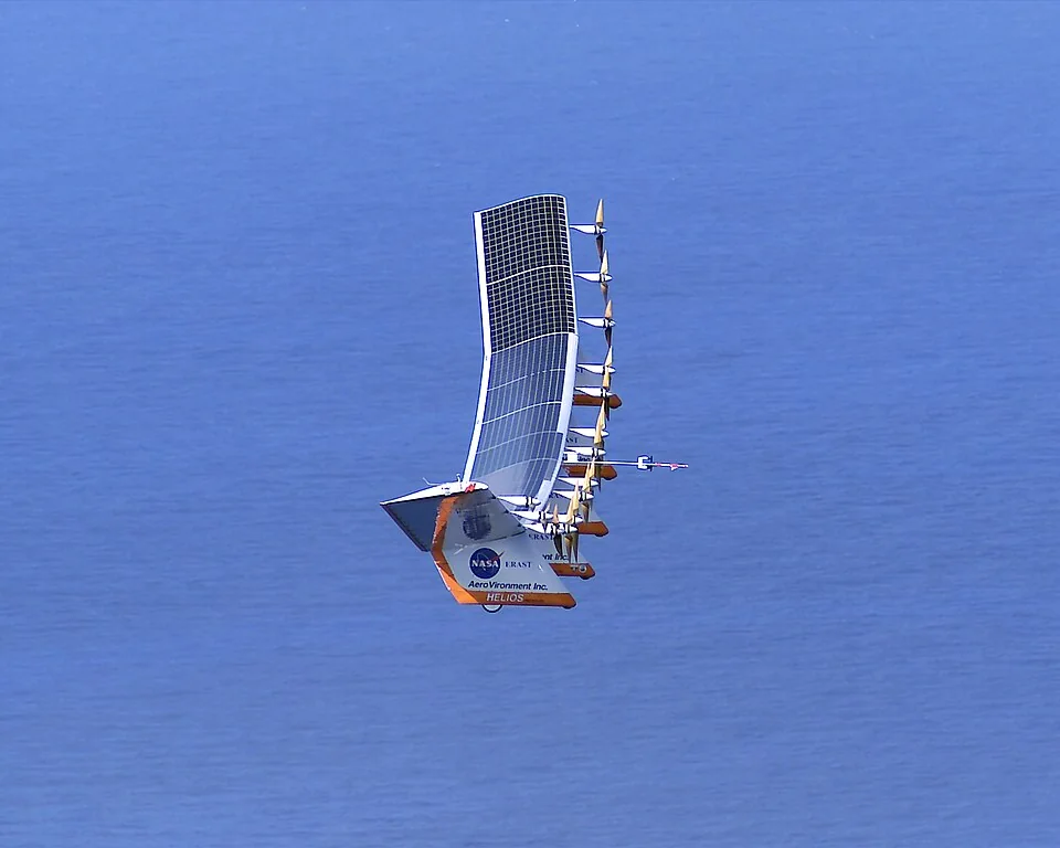 NASA Helios Prototype solar-powered aircraft climbing out over the Pacific Ocean